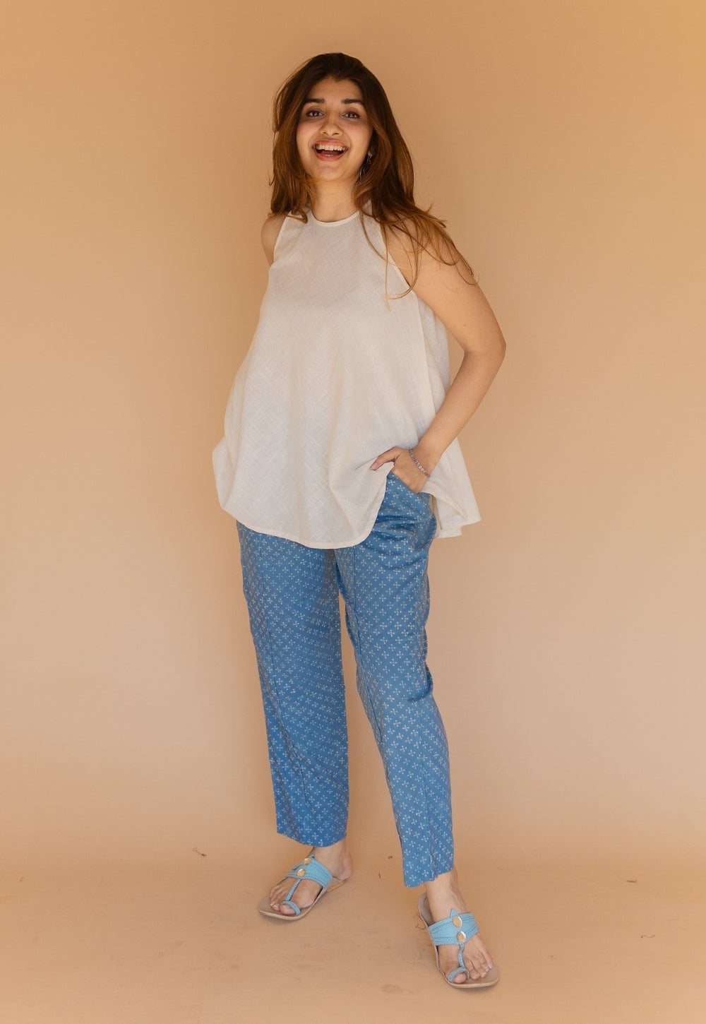 Parveen Off White Solid Slub Cotton A Line Short Top