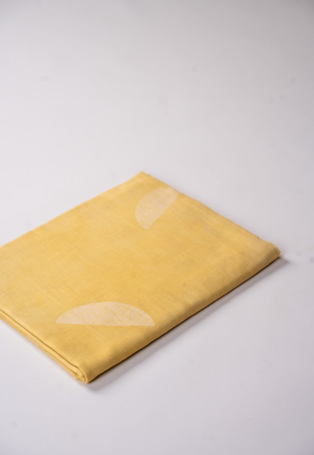 Yellow Semi Circle Pattern Batik Handblock Printed Mul Fabric