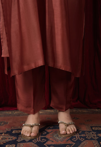 Prita Orange Solid Muslin Narrow Pant