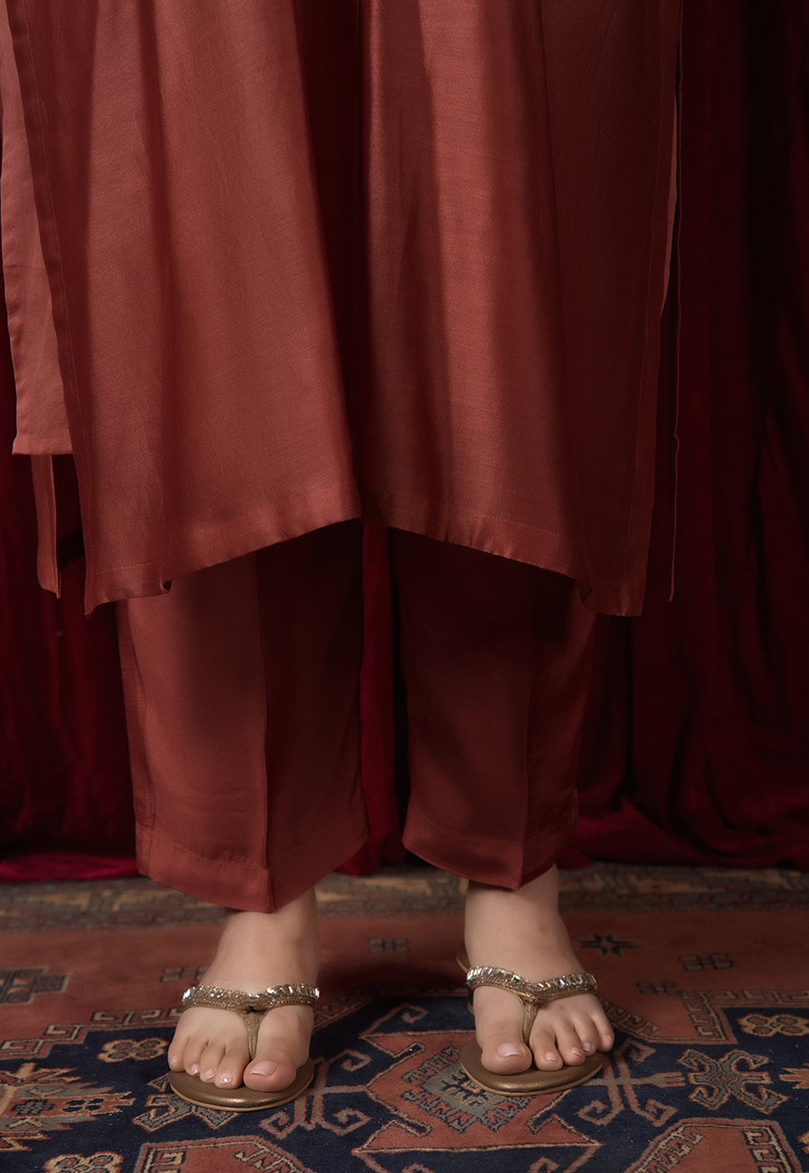 Prita Orange Solid Muslin Narrow Pant