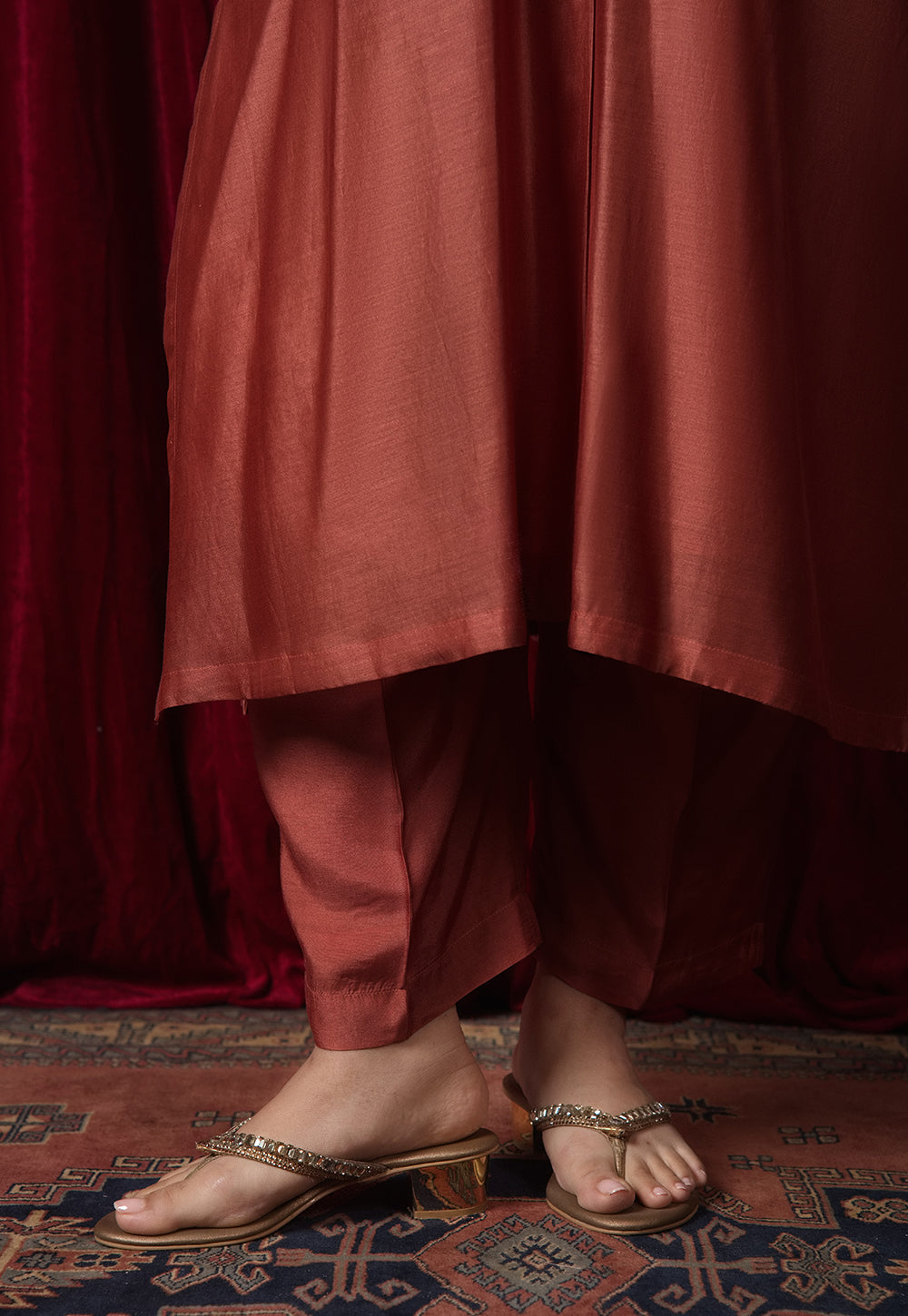Prita Orange Solid Muslin Narrow Pant