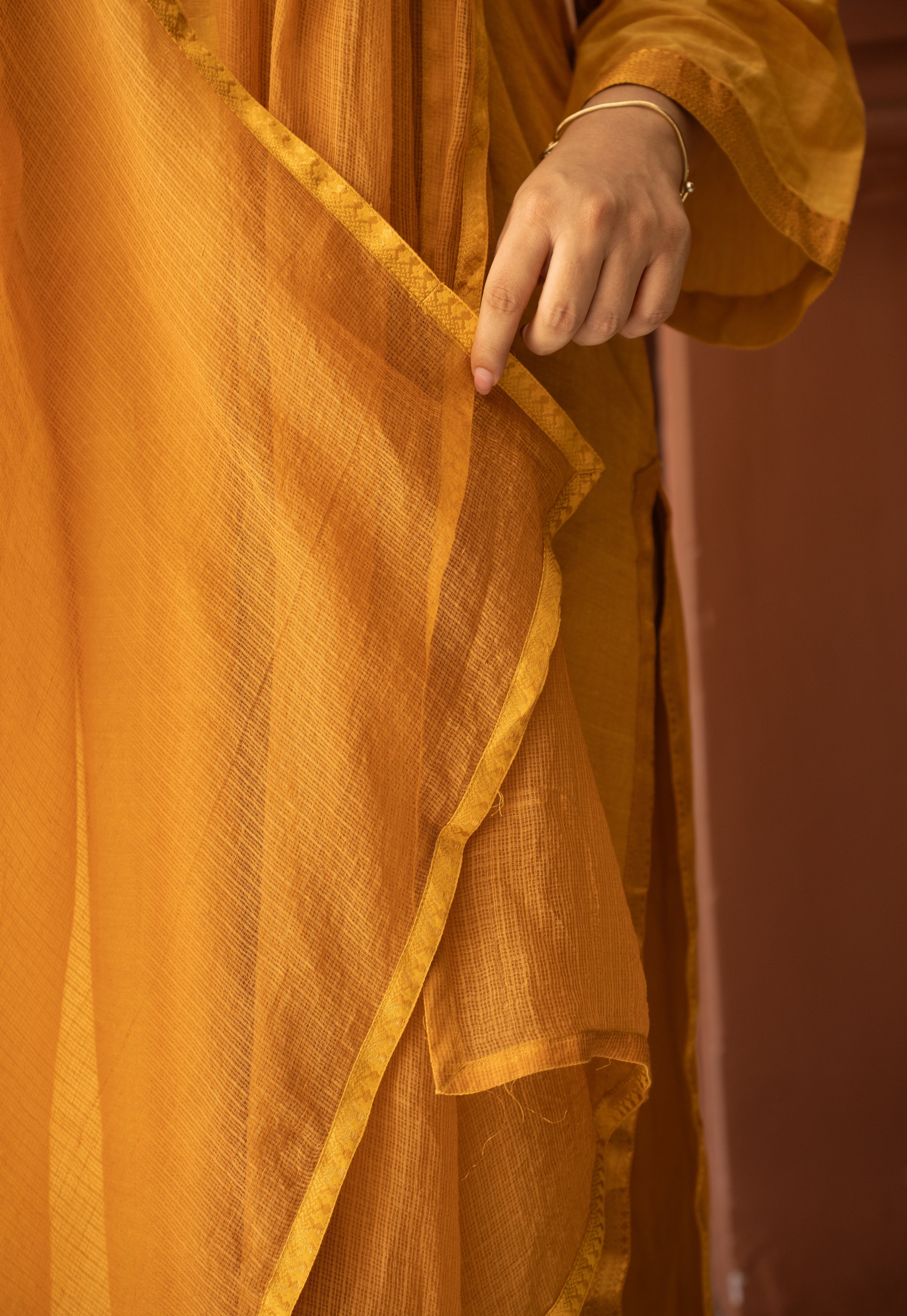 Mustard Solid Kota Doria Cotton Dupatta with Mangalgiri Border