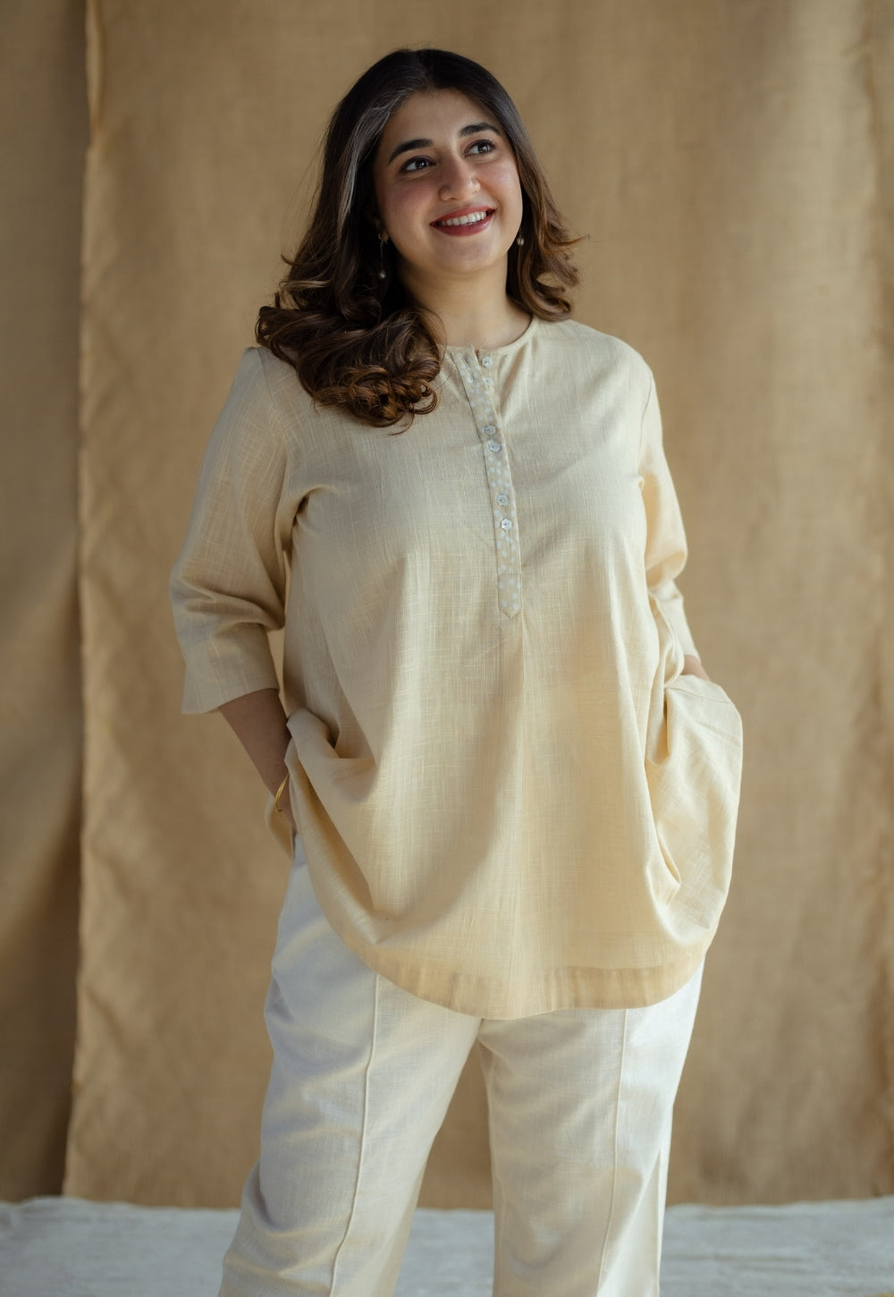Afifa Cream Solid Slub Cotton A Line Short Top